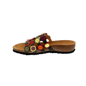 The Think! Julia 247 slide is designed for summer, with airy and stylish construction and cheerful decorations. The material is soft and comfortable, while the wide instep strap provides optimal support. The multi-colored leather details add an extra flair to the shoe.