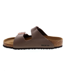  Crafted with durable and easy-to-clean Birkibuc material, this mini version of the classic two-strap sandal features adjustable buckles and a contoured cork-latex footbed to keep their feet comfortably supported while they play and explore.