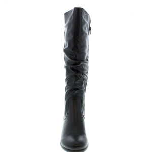 The Taxi Boston Waterproof knee-high boot offers reliable traction in rain or snow with its durable rubber outsole and cozy faux fur lining. The inside zipper ensures quick and easy on and off, making it a perfect choice for any cold-weather wardrobe.