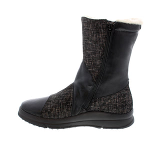 Stay warm in style with the Cloud Dolly Wool insulated boot. This winter boot is designed with a wool lining and a side zipper for easy on/off. The gripped outsole provides reliable traction in snowy conditions, helping you stay sure-footed.