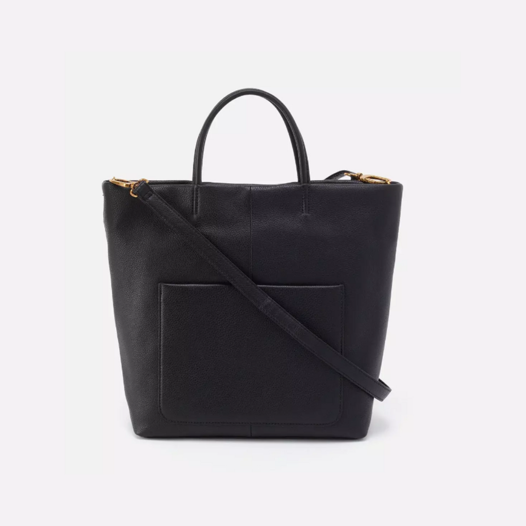 The Hobo Bags Tripp - is the ultimate tote - perfect for everyday use and special occasions alike. It features top handles, exterior slip pockets, a removable strap, and a roomy interior; all seamlessly merging modern design with practical convenience. Effortlessly transition from day to night with style and ease!