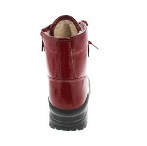 These Olang Spoke - Red winter boots are for the fearless fashionista who's ready to take on the winter weather! With their chic patent leather-style material and reliable grip on icy streets, these boots are the perfect winter companion when you're on the move! Go ahead - strut your stuff on the winter streets!
