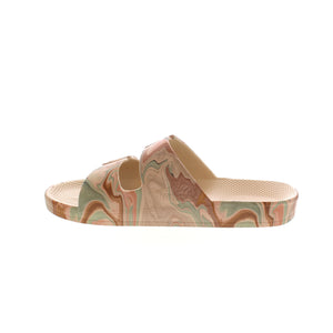 Freedom Moses Gaia Stone vegan slides are injected with air, so you feel like you're walking on a cloud. Featuring a multicolor natural marble print on stone, these slides are comfortable, waterproof and feature adjustable buckles for a secure fit. 