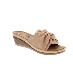 Experience comfort and style with the Janice-05 wedge Sandal. Featuring soft sock padding and a flexible outsole, these sandals are perfect for all-day wear. The beautiful tie detail adds a touch of fashion-forward design.