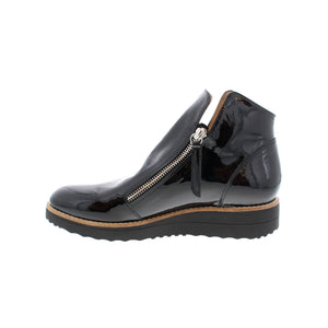 A sporty twist on a bootie - the Oh My Boot is designed with the softest leather with a flat wedge sole featuring a slip-on style and two zippers for easy accessibility. 