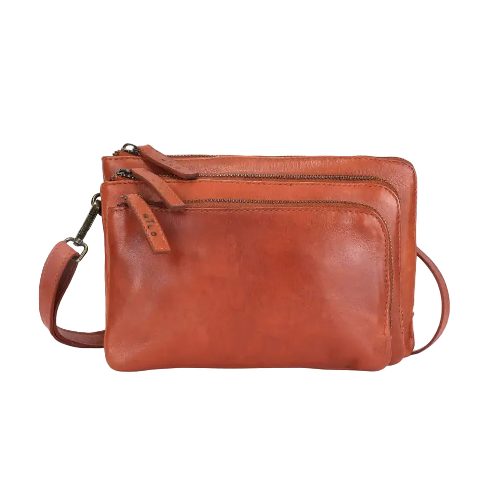 This black leather wallet features three practical sections and antique-inspired hardware. Measuring 9.1 × 5.9 × 2.4 inches, it combines a supple washed leather exterior with everyday durability and timeless style.