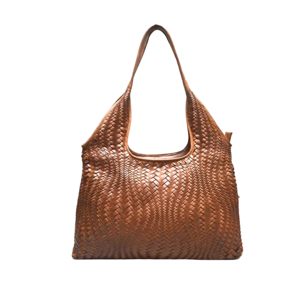 The Milo Livia combines spacious design with artisanal craftsmanship. This handwoven leather bag offers ample room for daily essentials and travel necessities. The soft washed finish reveals rich texture and depth, while the durable leather upper and fabric lining ensure lasting quality.&nbsp; This versatile piece transitions seamlessly from everyday use to weekend getaways.