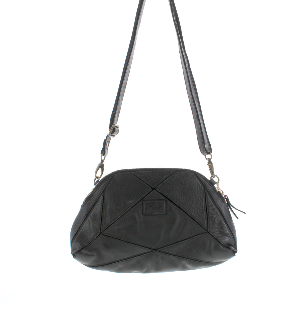 The Milo Bianca crossbody bag is precisely crafted to securely carry all your essentials. Offering ample storage and several compartments, it keeps your belongings well-organized, making it a valuable addition to your wardrobe.