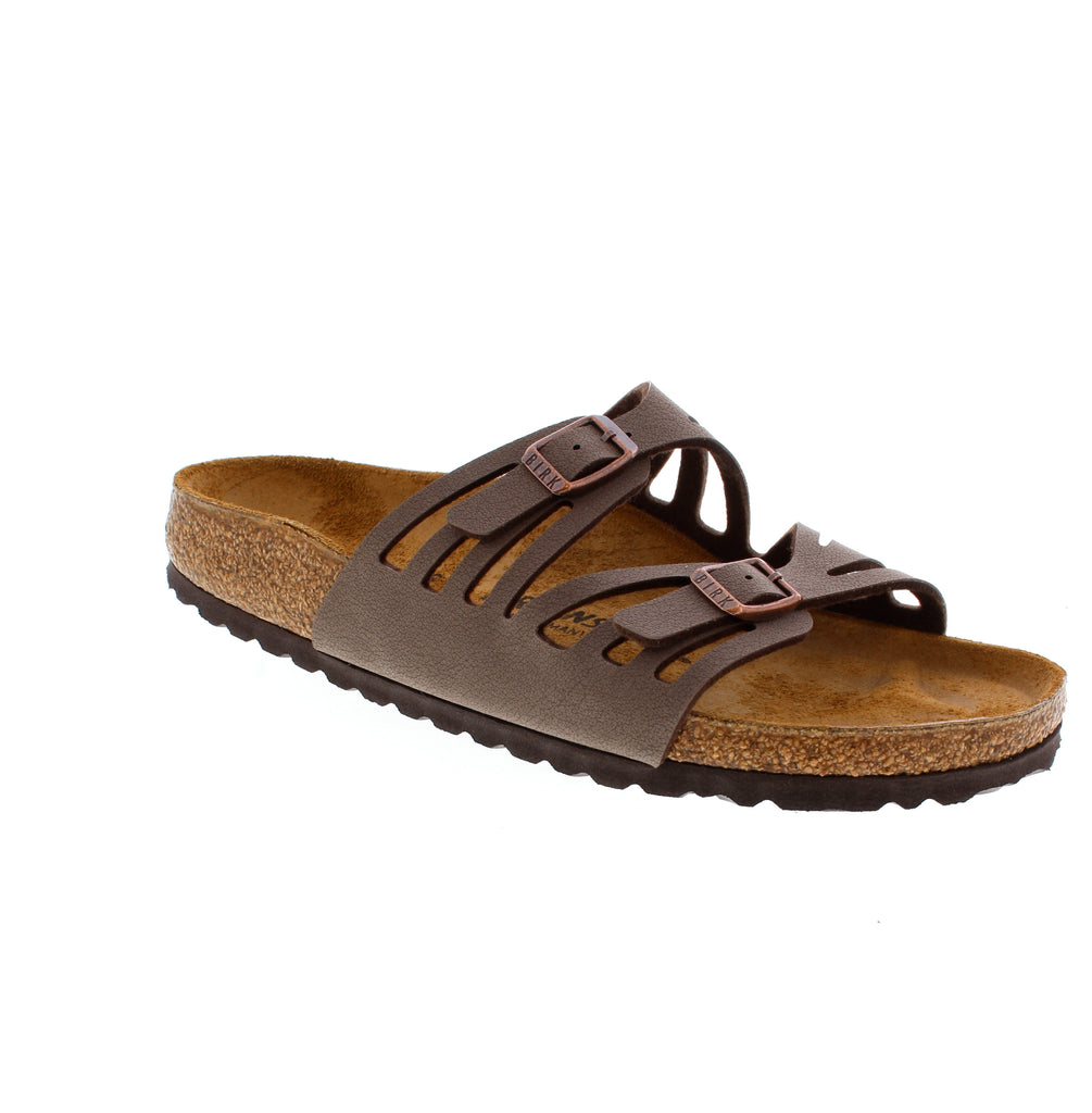 The Birkenstock Granada in Mocha delivers exceptional foot support. This strappy sandal features Birkibuc upper and adjustable buckles for the perfect fit. A great choice for those prioritizing foot health during summer activities while maintaining everyday practicality and comfort.