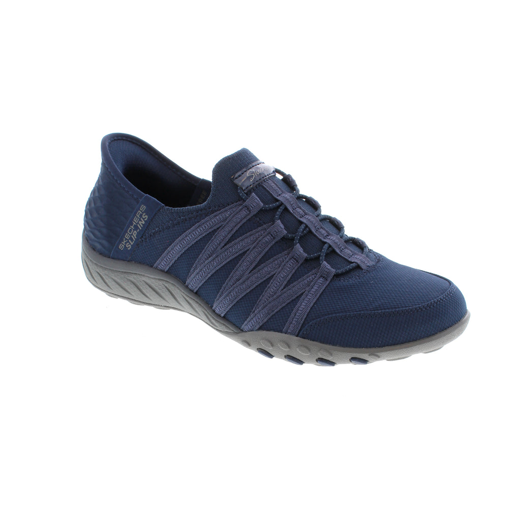 Experience unparalleled comfort and convenience with the Skechers Slip Ins: Breath-Easy. Featuring an exclusive Heel Pillow™, soft knit mesh upper, and Skechers Air-Cooled Memory Foam® insole, this easy-to-wear style provides superior cushioning and breathability with every step.