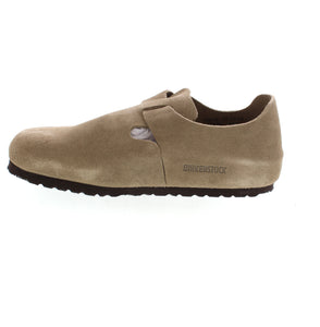 The Birkenstock London in Taupe combines simple design with ultimate comfort. As one of Birkenstock's original closed-toe styles, it features clean lines and an adjustable buckle strap for ease of wear. The iconic footbed provides unparalleled support while the soft suede upper gives a natural, rustic look.