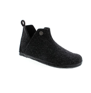 Stay cozy on chilly evenings with the BIRKENSTOCK Andermatt slipper boot. Featuring an ankle height, shearling-lined footbed, and pull tab for easy on and off, this wool felt slipper provides both warmth and convenience. Perfect for lounging in comfort.