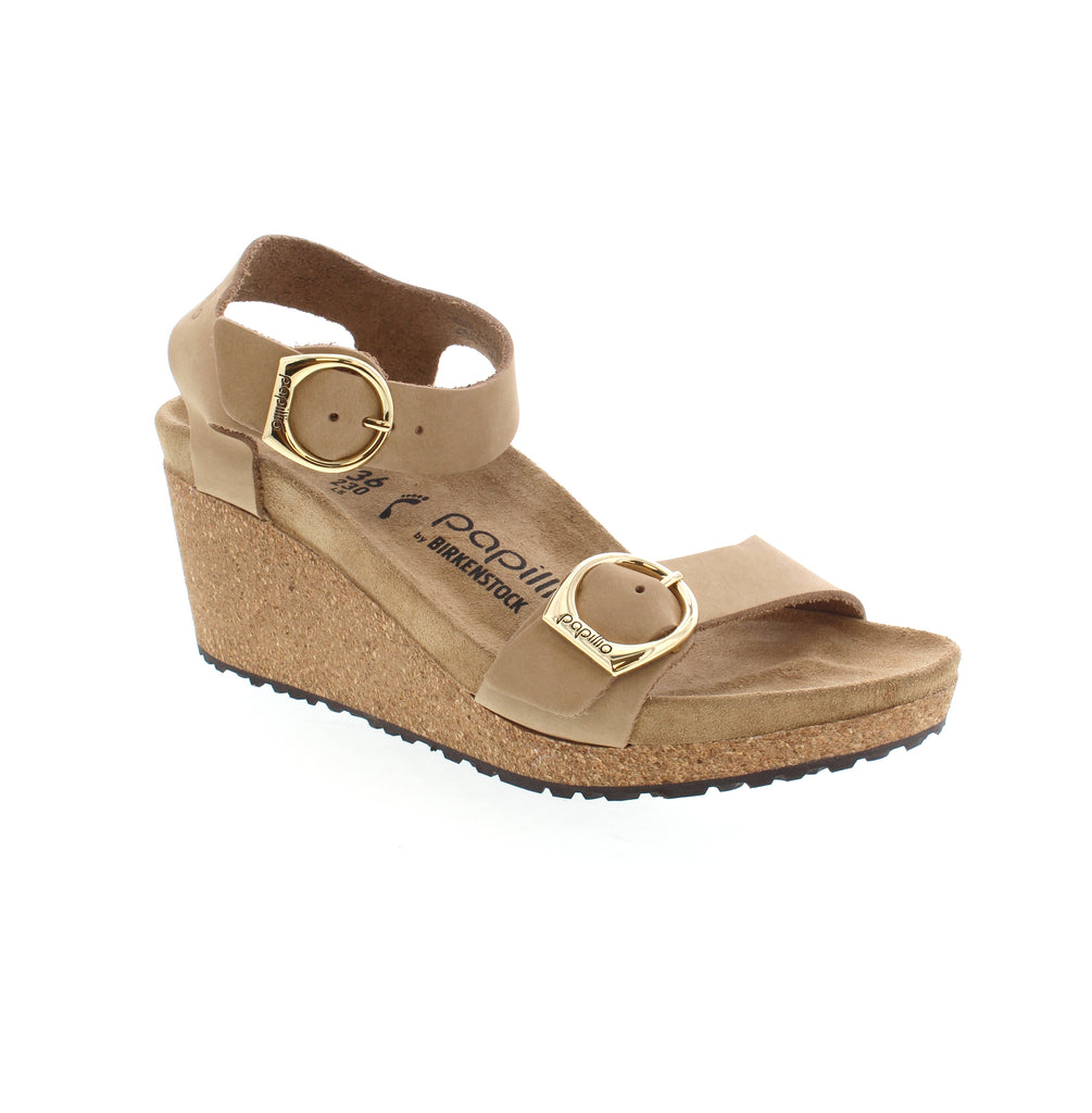 This classic wedge sandal is the perfect combination of simple and sleek! Featuring a soft, leather upper and buckle-adjust straps, this sandal will make any outfit look chic!