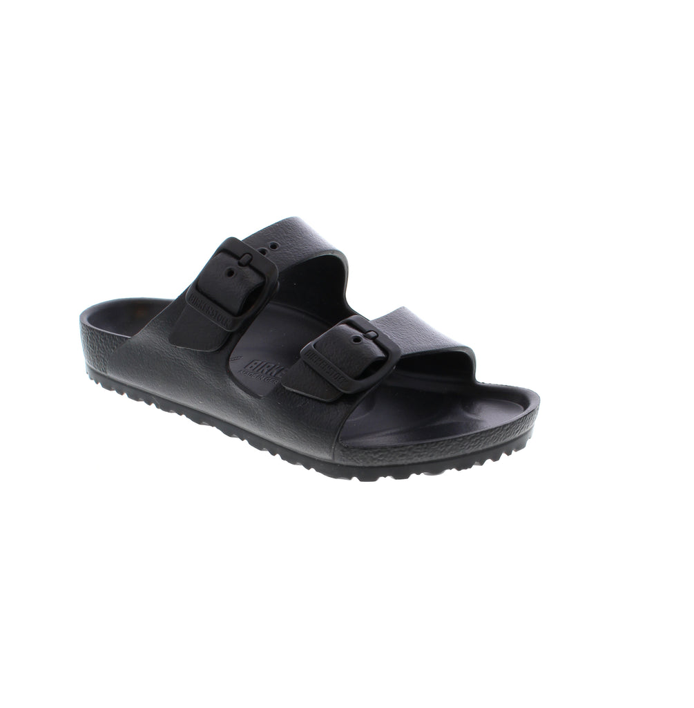 The Birkenstock Kids Arizona Sandal brings the iconic two-strap design to young feet in durable EVA construction. The lightweight, one-piece molded EVA resists water and absorbs shock, making them ideal for beach days, poolside lounging, and backyard adventures.