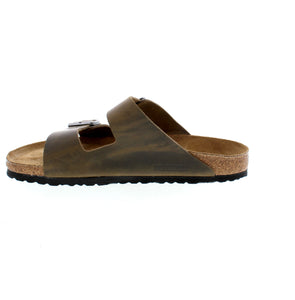 The iconic Arizona sandal from Birkenstock features the legendary two-strap design. Its signature comfort comes from the Birkenstock footbed, renowned for its support and durability. Made with an additional foam layer, the soft footbed delivers extra comfort for extended wear. The oiled nubuck leather upper adds a touch of sophistication to this timeless style.