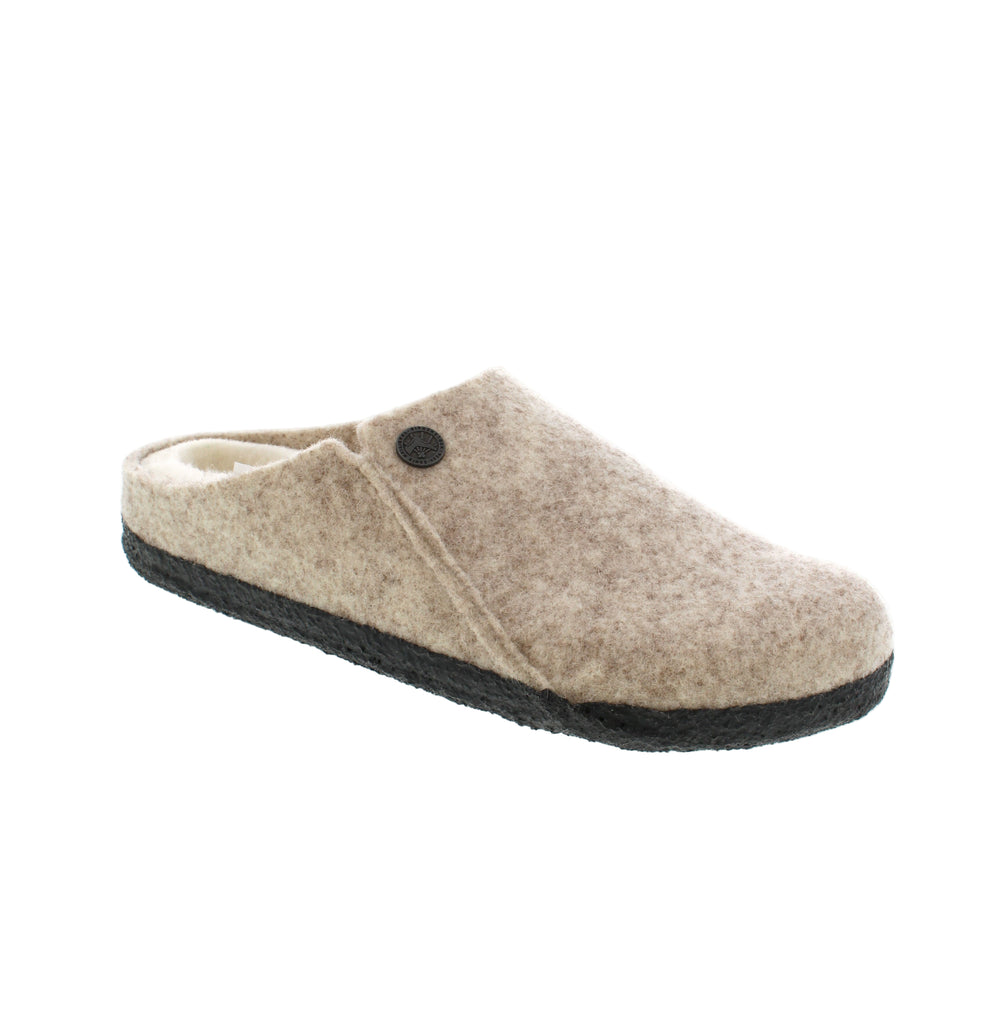 Experience unparalleled comfort with the Birkenstock Zermatt Slipper. Crafted with a soft wool upper and lined with genuine shearling, this slipper provides warmth and softness both indoors and outdoors. Its durable rubber sole offers reliable traction, while the signature Birkenstock footbed ensures exceptional support. Ideal for cozy relaxation or casual wear, this premium design makes an excellent gift for anyone who values comfort and quality.
