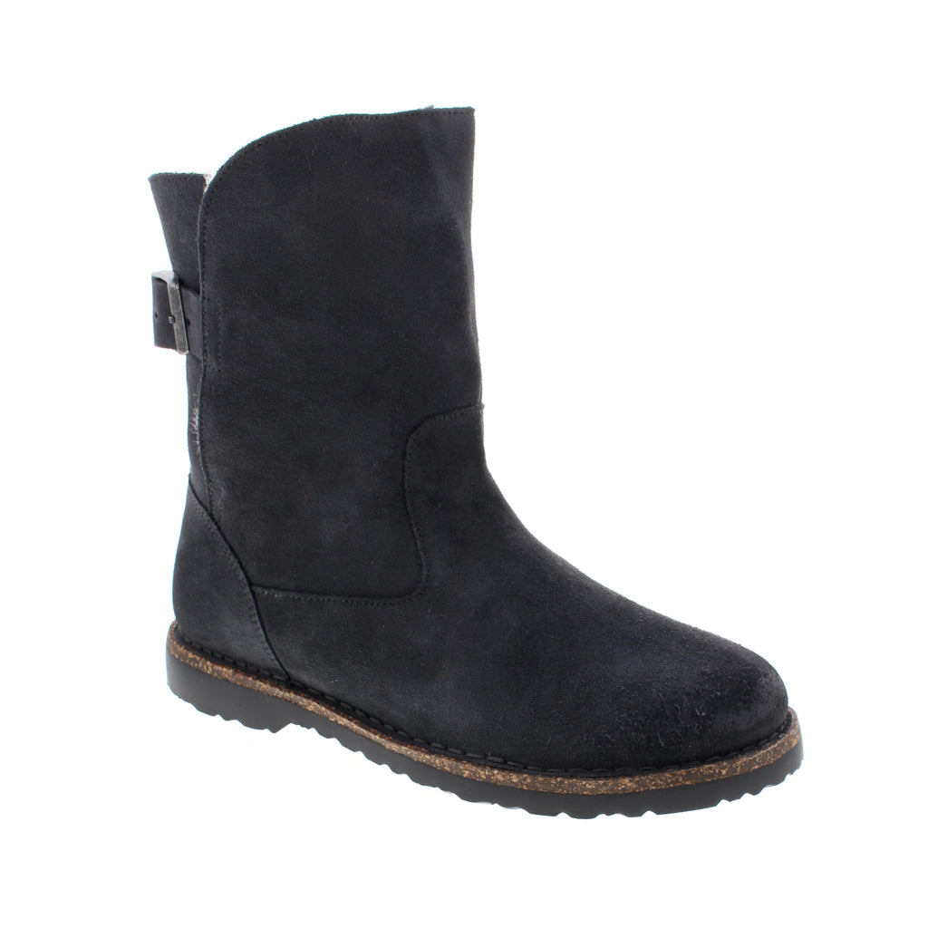 The Upsalla is the perfect cozy, mid-calf boot with a warm, genuine shearling lining. Designed with ultra-soft suede and a TR rubber for added grip and durability. These boots will help you stay stylish and supported, even on chilly days.