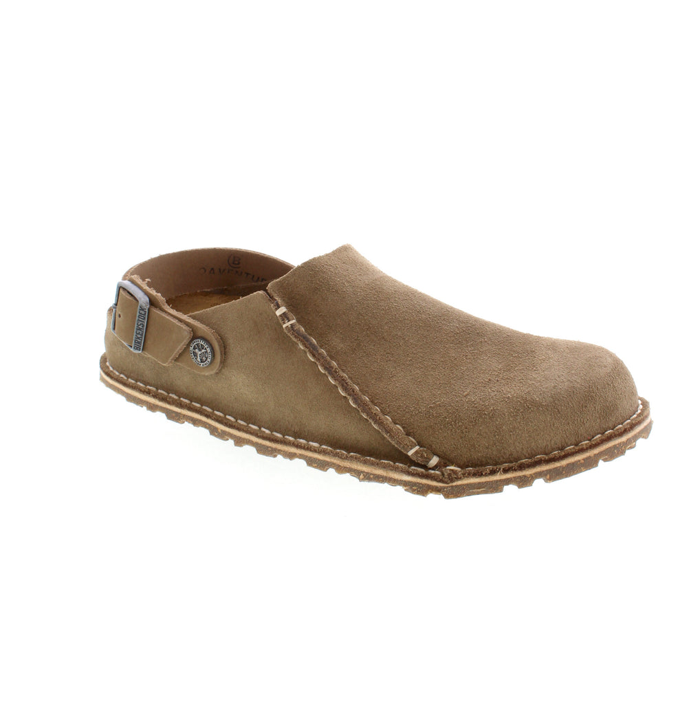 The Birkenstock Lutry is a versatile slipper, allowing you to wear it both as a backstrap style and an open clog. The removable footbed offers customizable support, while the soft suede upper provides a comfortable, natural fit. Perfect for all-day wear.