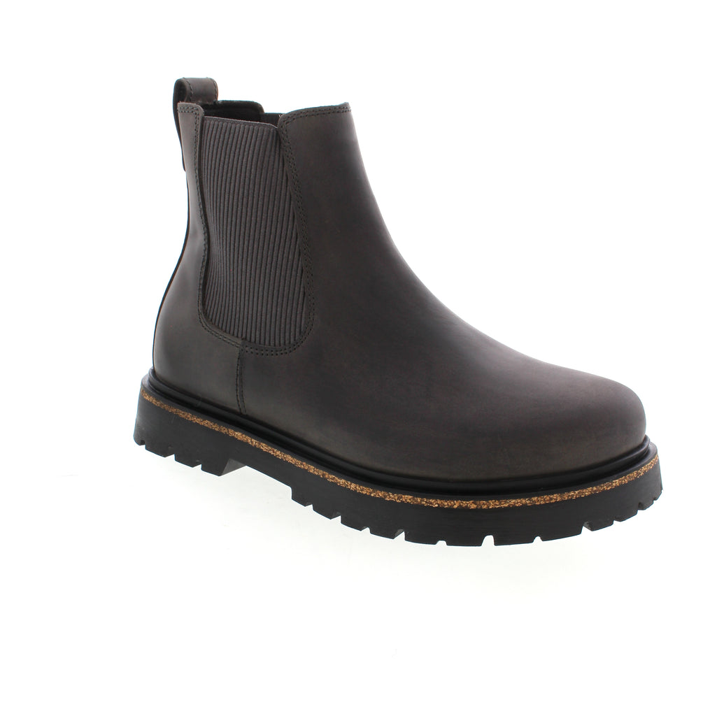 The Birkenstock Highwood boot combines classic suede with a BIRKENSTOCK cork PU midsole for heritage style and ultimate comfort. Featuring a premium Deep Blue Footbed and moisture-wicking lining, this boot optimizes your natural walking motion. Tread with confidence in both fashion and function.