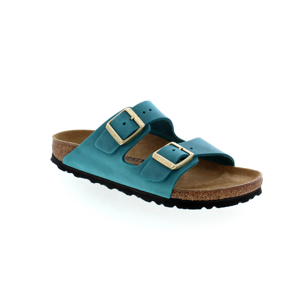 Discover the modern twist on the iconic Birkenstock design with the Birkenstock Arizona in Biscay. This next-generation style offers the same comfortable support as the original contoured footbed, featuring a single-strap look with expanded coverage and classic hardware.&nbsp;