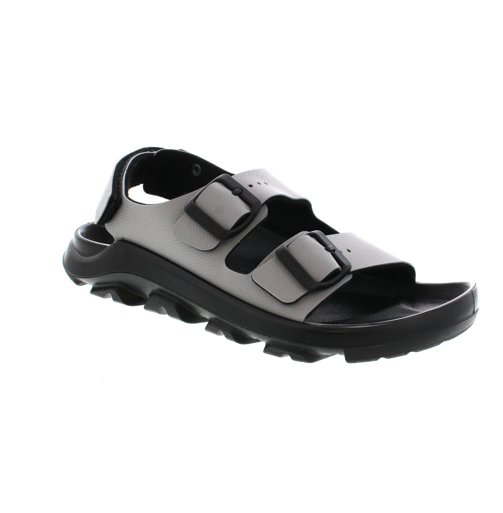 The Birkenstock Mogami Terra sandal is perfect for outdoor adventures. The contoured footbed provides waterproof comfort and toe protection, while the rugged PU sole offers durability and all-terrain grip. Made with easy to clean Birko-Flor®, this trail-ready style is designed to last. Step off the beaten path with confidence.