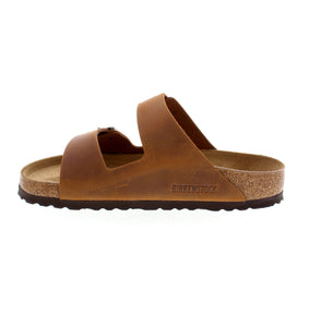 The Arizona is a Birkenstock classic! Featuring adjustable buckles for a timeless design and an original Birkenstock footbed, this sandal provides the ultimate comfort and support!