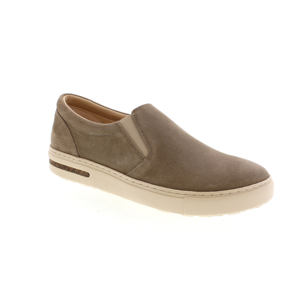 As an expert in foot support, BIRKENSTOCK® designed the Oswego shoe with a built-in support footbed for custom comfort that lasts all day long. Skip the laces and enjoy the ease of this classic suede shoe, shaped to your feet with wear for that timeless heritage feeling.