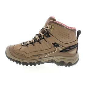 The Keen Targhee IV Mid WTP is the ultimate hiking companion, featuring durable and glue-free fused construction for a longer lasting boot. With unmatched cushioning that resists compression, you can experience maximum comfort on your trek. Say goodbye to multiple boots, this will be the last one you'll need.