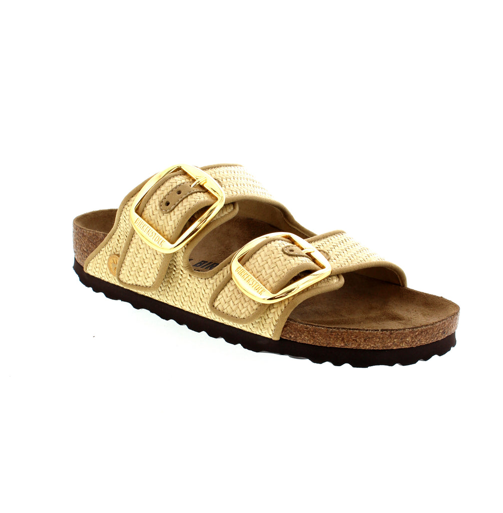 Have texture, will travel. The Arizona sandal brings on the breeze in summer-ready raffia. Offset with big buckles, this pair is polished enough for any occasion. A contoured footbed helps keep you comfortable long after the sun goes down.