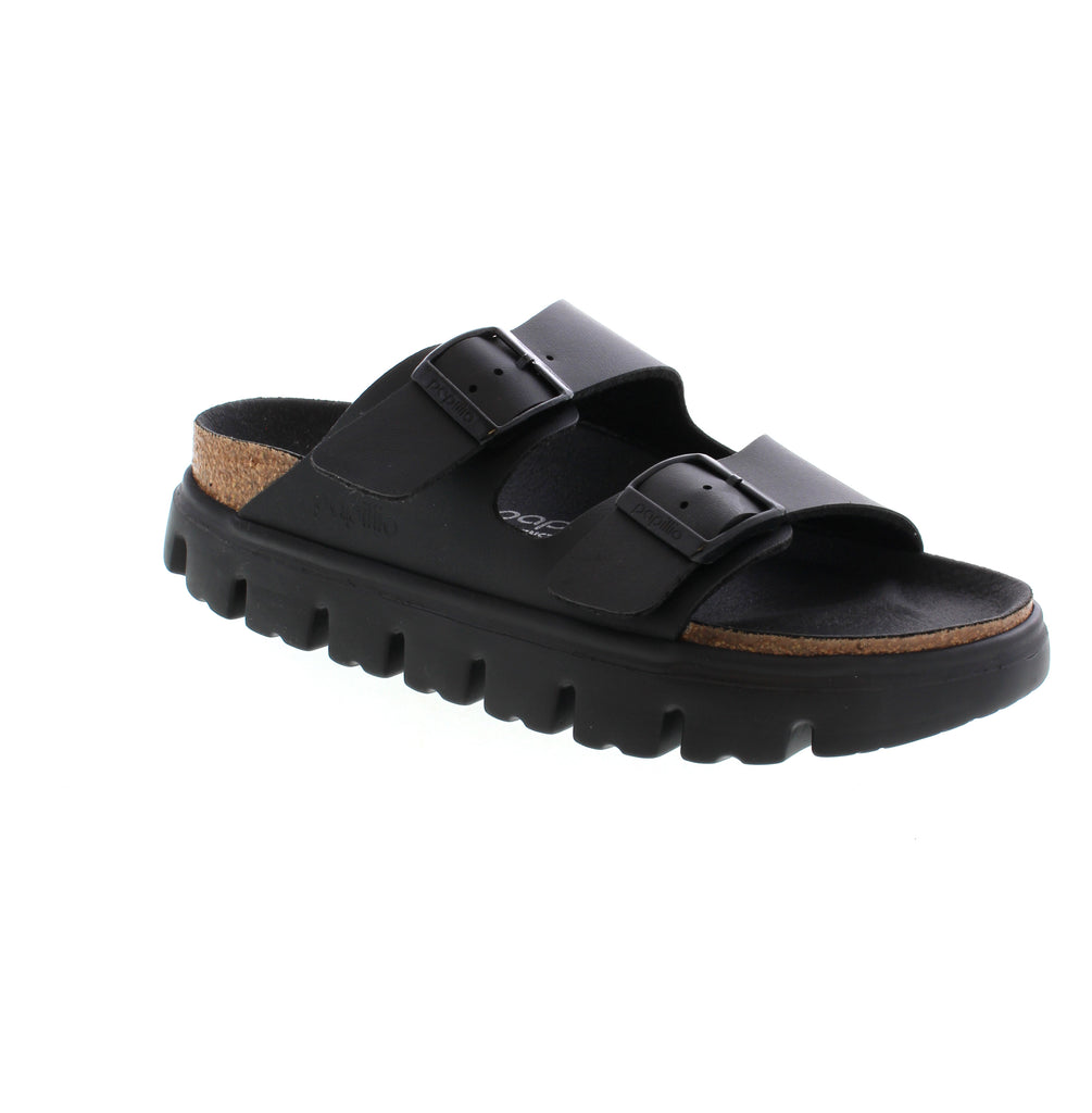 Elevate your style with the Birkenstock Arizona Chunky sandals. Featuring a chunky platform sole and premium leather wrap, these Exquisite sandals provide a seamless and luxurious look. The contoured footbed ensures maximum comfort for every step. Stand tall and stylish with this elevated version of the classic design.