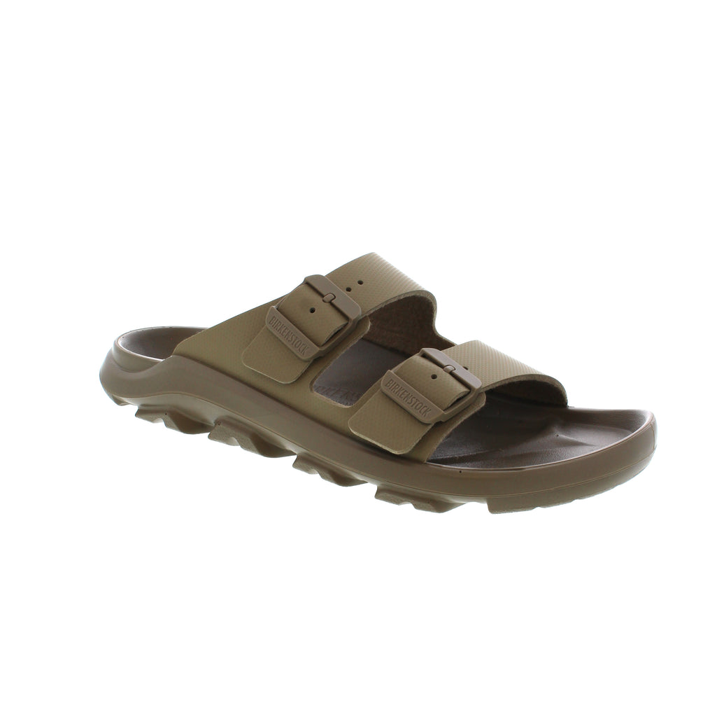 The Birkenstock Mogami Terra Slide is perfectly designed for any adventure. With a water-resistant footbed, durable sole, and two straps featuring a sleek and modern stealth buckle, this sandal is both functional and stylish. Made from skin-friendly and hard-wearing synthetic material, it's the perfect choice for any terrain.