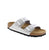 The Birkenstock Arizona in Glitter Silver combines decades of heritage with contemporary sparkle. This iconic two-strap sandal features a synthetic upper with a shimmering finish, delivering refined elegance without compromising the legendary comfort that made it a global staple.