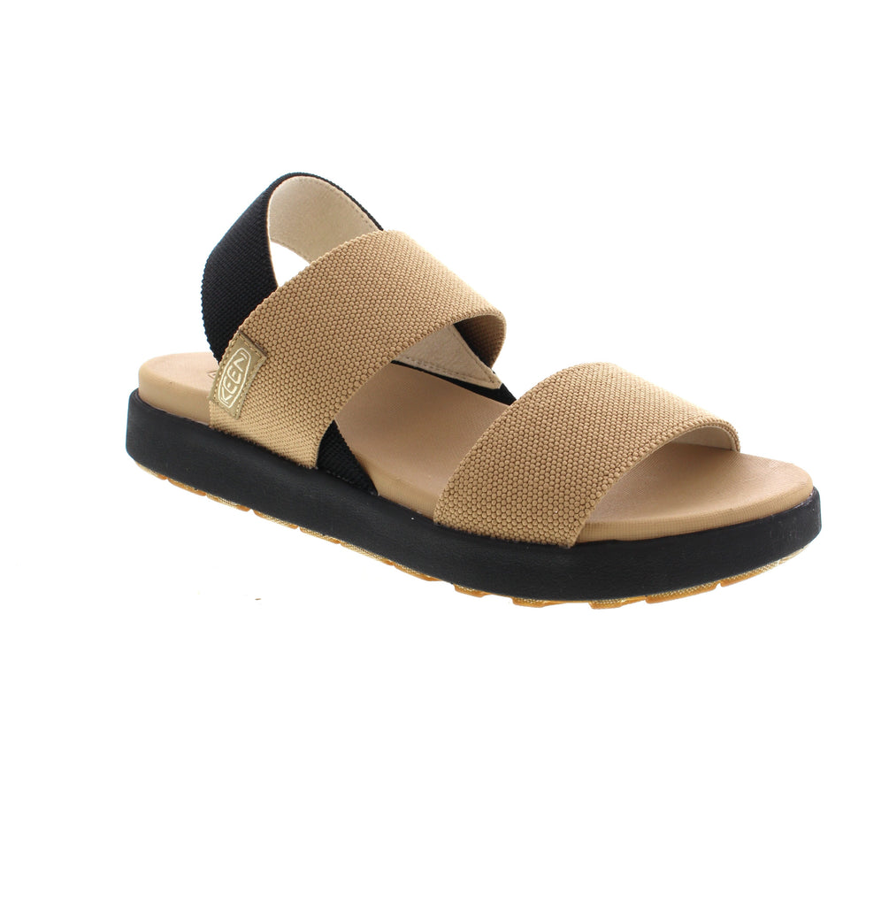 Expertly crafted for the active woman, the Keen Elle Sandal is your go-to for all your summer adventures. Made with sustainable materials, including stretchy straps fashioned from 100% recycled plastic bottles, this sandal also boasts a jute-infused outsole to minimize rubber usage - perfect for the eco-conscious consumer.