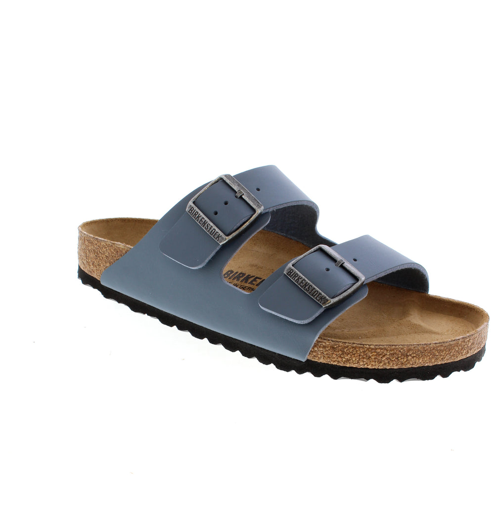 Birkenstock's Arizona delivers timeless comfort with precision engineering. Crafted from Birko-Flor uppers and a cork footbed, this sandal provides exceptional arch support. A great sandal for everyday summer outings.