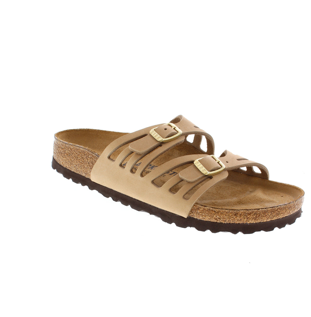 The Birkenstock Granada in Sandcastle delivers exceptional foot support. This strappy sandal features a nubuck upper and adjustable buckles for the perfect fit. A great choice for those prioritizing foot health during summer activities while maintaining everyday practicality and comfort.