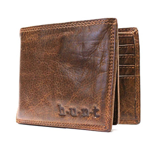 Expertly crafted from washed natural leather, the HUNT Wallet 66143 in Tan is a versatile and stylish essential. With numerous card slots and an ID slot, it offers easy organization and access. Plus, the washed leather adds flexibility without compromising on quality. 