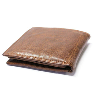 Expertly crafted from washed natural leather, the HUNT Wallet 66143 in Tan is a versatile and stylish essential. With numerous card slots and an ID slot, it offers easy organization and access. Plus, the washed leather adds flexibility without compromising on quality. 