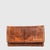 The HUNT Wallet 66150 is made from washed natural leather. This wallet offers ultimate flexibility and durability while still maintaining the classic quality of hunt leather. With card slots, transparent ID window, and a double compartment for paper money, you'll have everything you need in one stylish accessory.