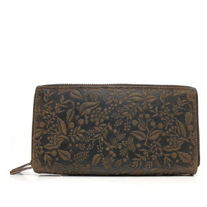 As a women's wallet from Hunt, the HUNT Wallet 7020-151 is crafted from natural embossed and raw leather. Its double compartments, one with multiple card slots, ID windows, and paper money slots, and the other with a zip pocket and ID window, offers both organization and a unique style.