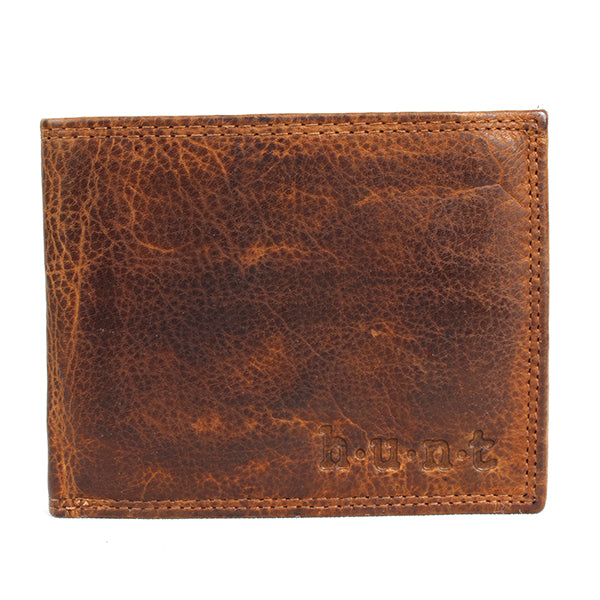 The HUNT Wallet HU103013 is made from washed natural leather. This wallet offers ultimate flexibility and durability while still maintaining the classic quality of hunt leather. With multiple card slots, transparent ID windows, and a double compartment for paper money, you'll have everything you need in one stylish accessory.&nbsp;