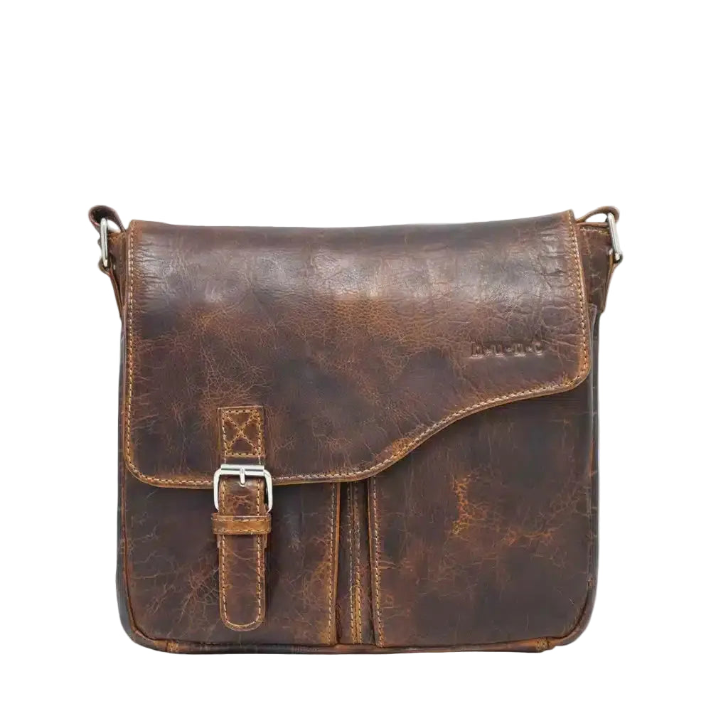 The HUNT HU523013 leather handbag offers functionality and style with its genuine vintage leather and multiple pockets. The adjustable shoulder strap allows for comfortable wear. The washed leather and buckle adds a trendy vintage look.
