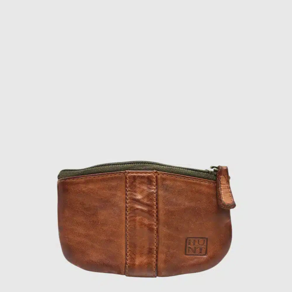 The Hunt HU602345 Coin Purse is a compact leather pouch with 2 top zippered pockets. Perfect for everyday carry.