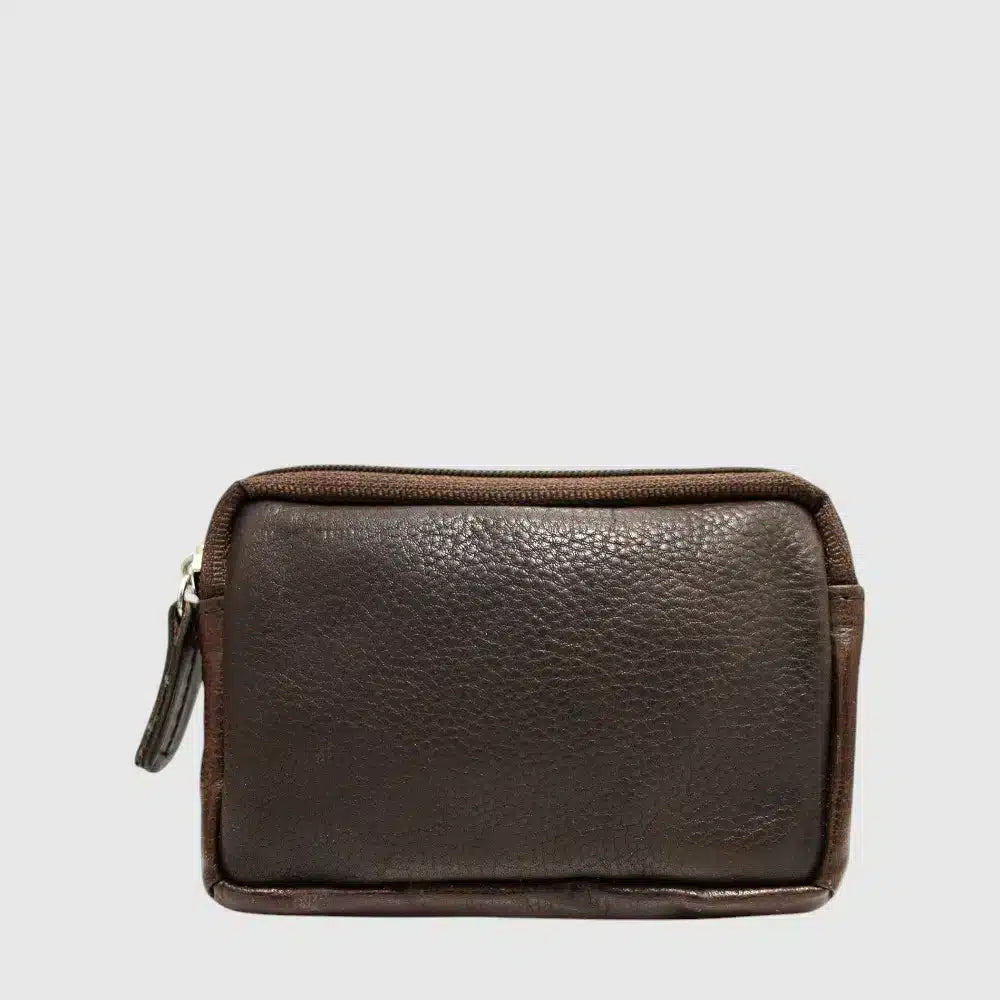 The Hunt HU618036 is a compact brown leather coin pouch with top zippered pocket. Perfect for everyday carry.