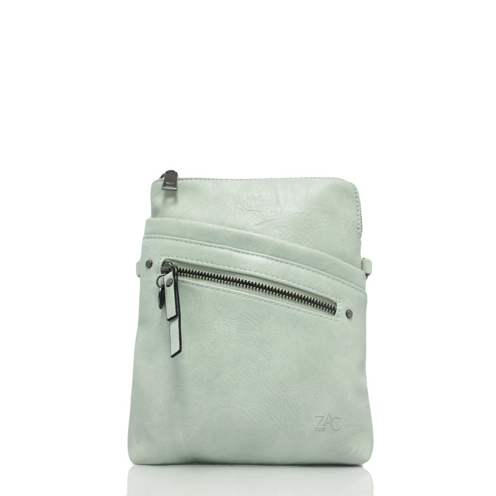 This ZAC CM29261- bag is a stylish and practical accessory. Crafted from vegan leather, it features a zippered main compartment with sections for cards, a secondary pocket to maximize organization, and a rear cell phone pocket for easy access. The thin adjustable and detachable shoulder strap lets you carry the bag as a shoulder bag or crossbody.