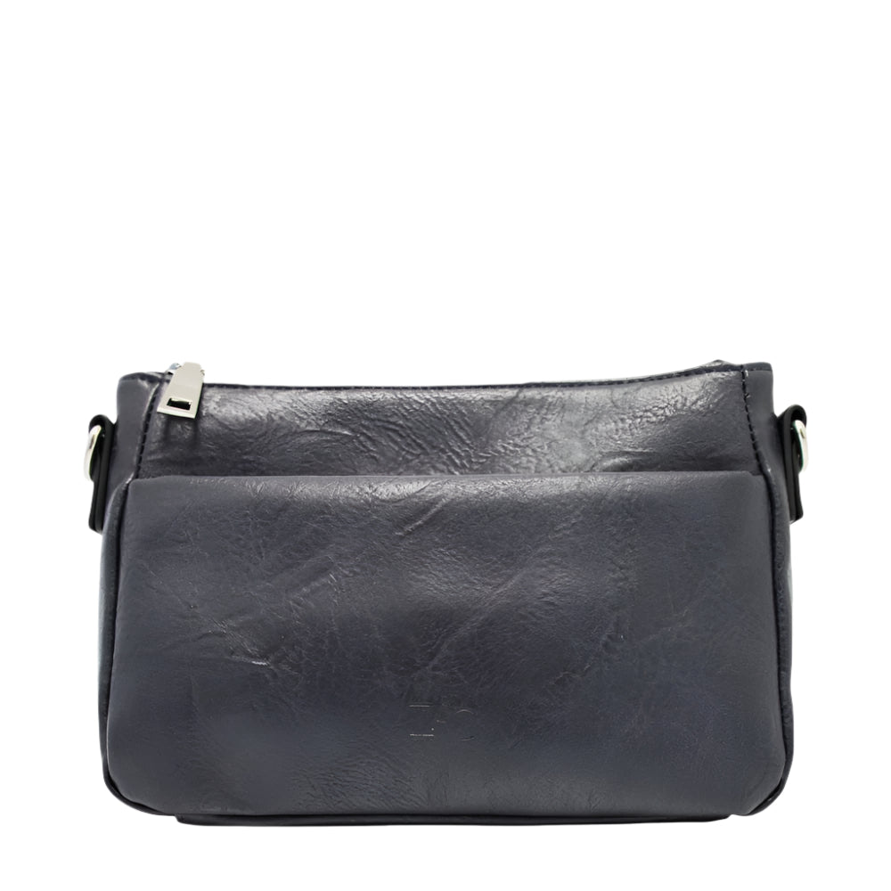 Crafted with vegan leather, the Zac CM33359-62 - Marine offers durability and sustainability. The top zippered pockets and an adjustable shoulder strap provide convenience and style. With additional pockets for organization and a phone pocket for easy access, this bag is perfect for on-the-go lifestyles.