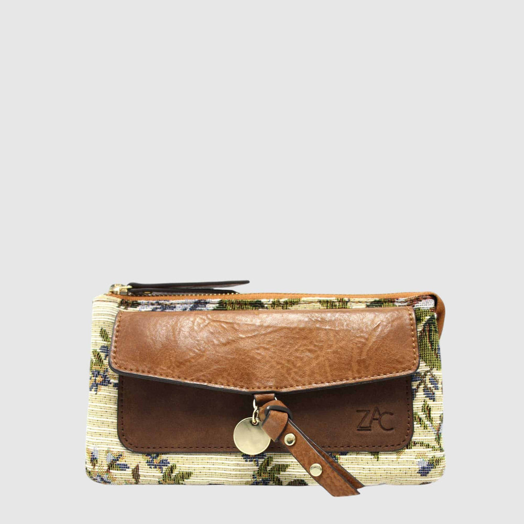 Introducing the Zac P1357-22-01 handbag. Stylish with vegan leather and floral fabric. Two compartments with one zipper top makes it easy to access and organize your items.