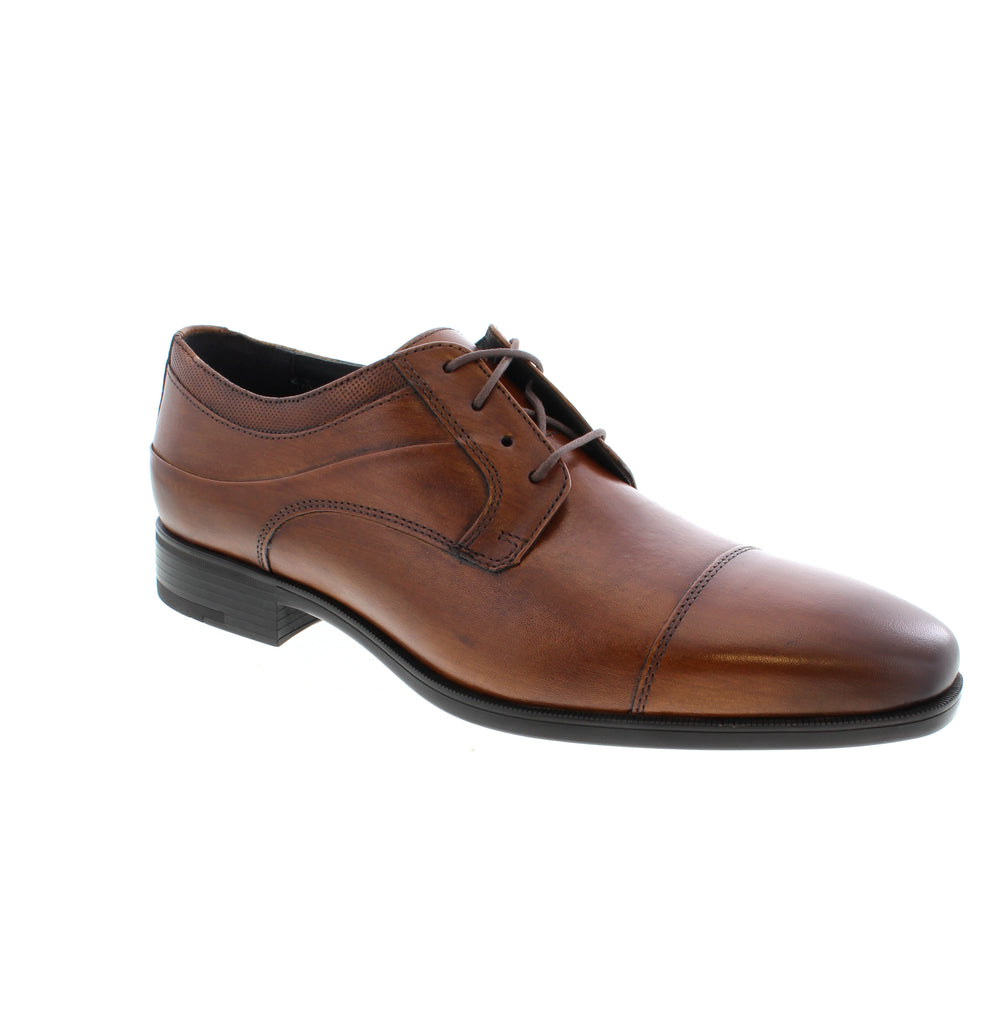 Timeless sophistication meets everyday comfort in the Johnston &amp; Murphy Gibbons. This classic derby dress shoe features a refined cap toe and pointed toe design, crafted from premium mahogany full grain leather for a polished look that transitions seamlessly from the boardroom to evening occasions. Built with a leather upper, lining, and footbed for lasting comfort and durability, the Gibbons features a responsive foam midsole and reliable rubber outsole.