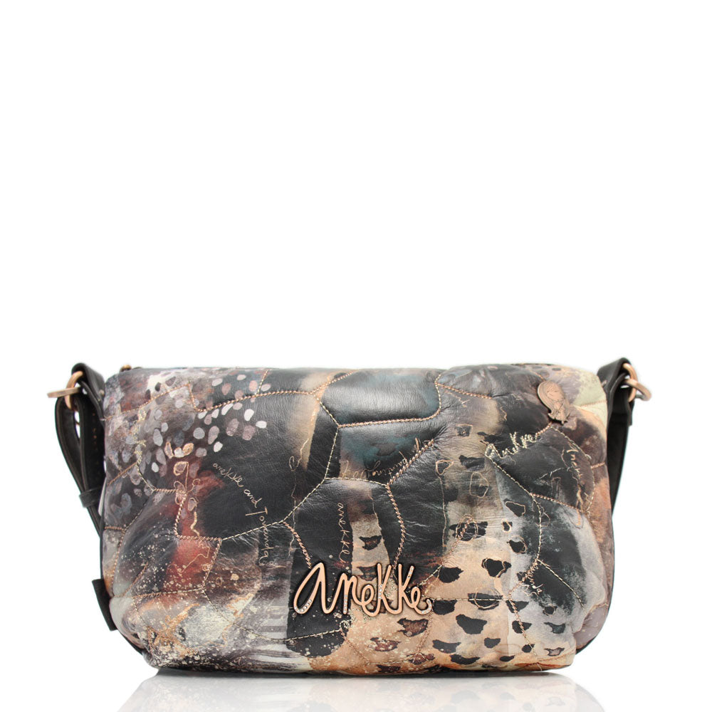 The Anekke Shōen Padded shoulder bag is a tribute to the legendary Japanese painter who changed the art world. This unique bag features a quilted effect, metal handle and shoulder strap, and adjustable length. Perfect for adding a splash of fashion to your outfit while staying organized with its zip closure, lining, and pockets.