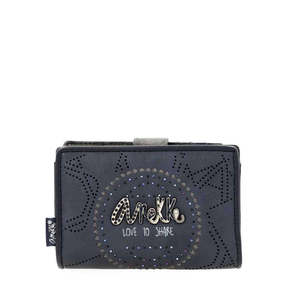 Channel your inner Hollywood glamour with Anekke 38759-902. This Studio Navy collection is inspired by the resilience of scientist and actress Hedy Lamarr, featuring unique pieces of jewelry with embroidered cinema and science motifs. Adorned with rhinestones, pins, and pearls, each piece is a work of art. Get ready to shine!