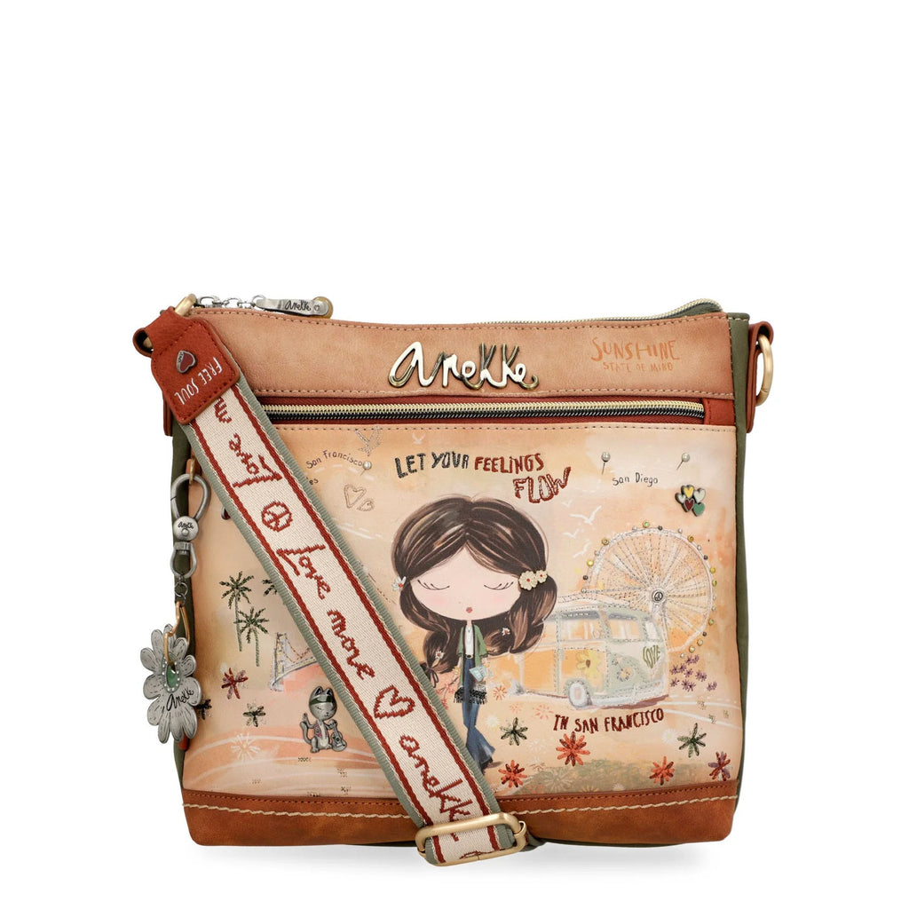 Ready to travel back to the 60s with Anekke Peace &amp; Love's bag! Perfect for the free-spirited, it features vibrant pins, playful embroidery, and empowering messages. Step into the hippie movement with this unique, detailed collection - a piece of your own personal flower power!